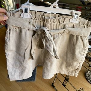 tan shorts, super cute bow as belt